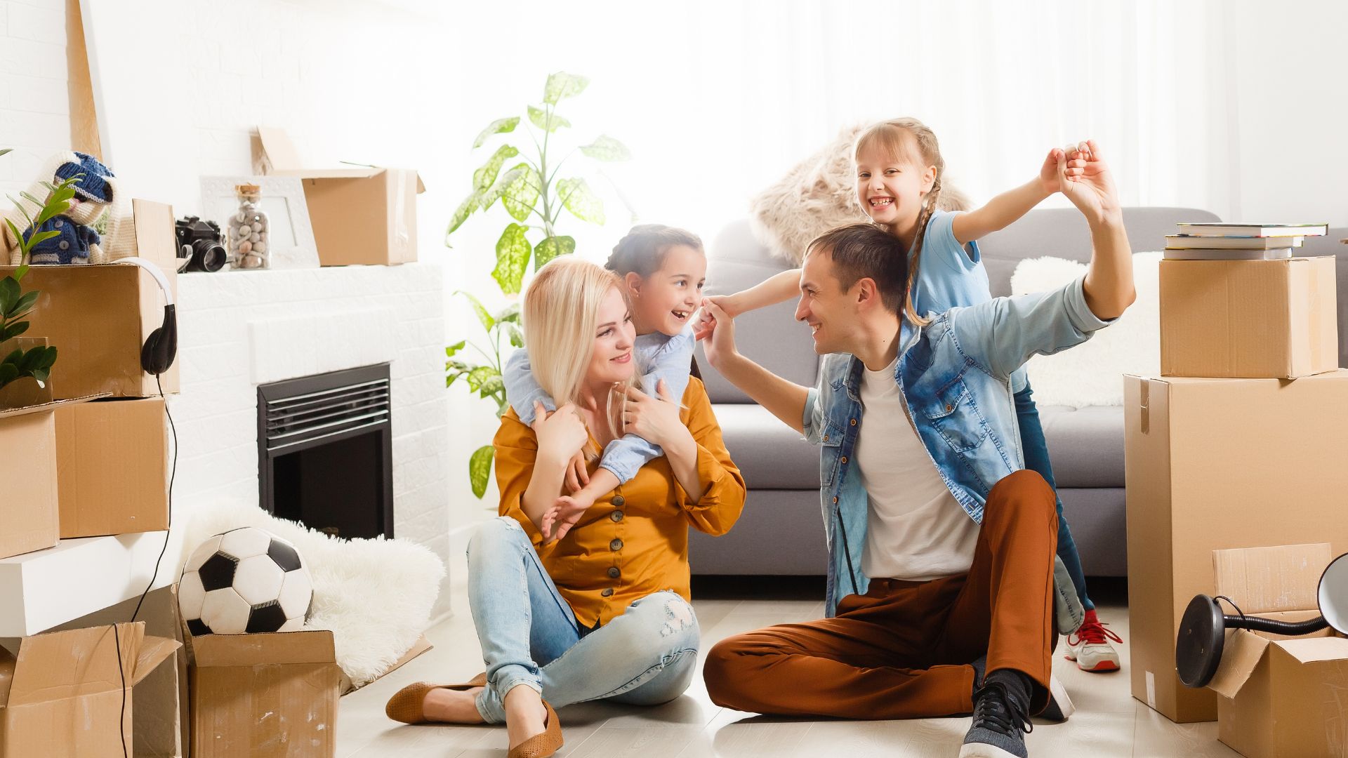 happy-family-with-moving-boxes